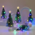 Mini LED Weihnachtsbaum für den Schreibtisch mit bunten Lichtern und weißer Basis - Grün