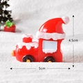 Train de Noël miniature en résine rouge avec effets de neige blanche et finition pailletée - Nouvelle Locomotive à Chapeau de Noël