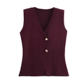 Close-up of wine red knitted V-neck vest with detailed gold buttons on white background - S / Fuschia