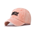 Detailed view of distressed edges and 'LUCK' embroidery on washed orange baseball cap - Adjustable / Washed Pink (LUCK)