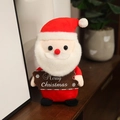Peluche di Babbo Natale con cartello Merry Christmas, cappello rosso e barba bianca, 20cm - Babbo Natale