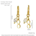Pendientes de aro de acero inoxidable en oro de 18K con nácar y perlas blancas - Dorado
