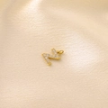 Golden micro-paved letter N pendant with white zircon crystals on yellow silk fabric - Letter Z / Gold