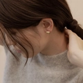 Minimalist wide gold hoop earrings with brushed matte texture on model's ear - EH0590/Gold Wide Brushed Stud