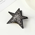 Star-shaped black acetate hair claw clip with sparkling rhinestones and gold base - Large Star Shape / Black With Rhinestones