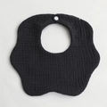 Detail view of black petal-shaped 6-layer cotton gauze baby bib with secure snap button - Dark Grey