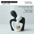 Modern black and white ceramic couple hug statues with golden hearts for home decor - Mini Large / Black and White