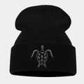 Close-up of turtle embroidery on a black knitted beanie with high-quality stitching details - Black