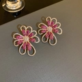 Detailed view of rose red and clear crystal floral earrings with hollow gold metal design - 36# Gold Rhinestone Flower (36#)