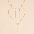 Flat lay of a gold geometric rectangular necklace and matching drop earrings on beige background - Gold 2-Piece Set
