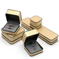 Premium champagne gold jewelry set boxes with black trim and velvet interior padding - Pendant Box / Gold