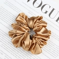 Chic champagne gold satin oversized scrunchie with a glossy silk texture for women - Camel