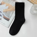Classic black crew socks in soft cotton knit with comfortable elastic ribbed cuffs - Black