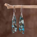 Detail of bohemian teardrop earrings with colorful stone mosaic on a natural wood branch - Blue Brown White Patchwork Triangle Style (ER1034-2)