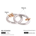 Detailed macro view of two-tone stainless steel layered rings with textured pavé setting - US 7 / Silver & Rose Gold Overlapping Style (NB-R24404)