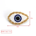 Detail view of Evil Eye brooch with dimensions 52mm x 32mm and weight 10.2g - Gold White Blue Black Evil Eye-BE1504WH00
