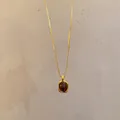 French vintage style gold pearl necklace with a translucent amber-toned gemstone pendant - X1705 Gold - Lava Brown Gem
