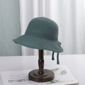 Sage green crochet bucket hat with textured weave and matching adjustable chin strap - M (56-58cm) / Dark Green