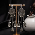 Detail view of vintage silver tassel earrings with floral discs and hanging bells - S4140 Antique Silver