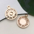 Rose gold sun totem pendant charm for DIY necklaces with polished metal finish - Hollow Vintage Sun