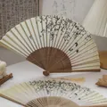 Classic Chinese folding fan with ink butterfly print, bamboo ribs and long silk tassels - Brown Apricot Blossom