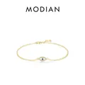 S925 sterling silver evil eye bracelet in gold finish with blue crystal and zircons - 925 Silver / Gold