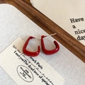 Detail view of U-shaped red enamel earrings with silver posts on vintage fabric - 14# Silver Earring Post Red Square French Hoop