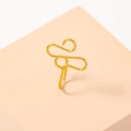 Minimalist U-shaped non-pierced golden nose ring clip displayed on a pink stand - Non-piercing Clip-on / Gold