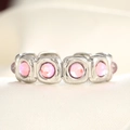 Polished silver adjustable ring featuring multiple square-set pink round gemstones - Adjustable Open / Steel Color Pink Translucent Stone