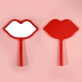 Red lip-shaped handheld makeup mirror showing front and back views on pink background - 12*16 Red