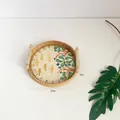 Handwoven rattan tray with blue fish pattern ceramic base and wood handles, 22cm diameter - Undersea World / Small 22x3cm