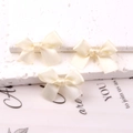 Set di 3 mini fermagli per capelli con fiocchi in raso crema per acconciature dolci - Bianco Sporco
