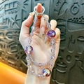 Double-layered crystal beaded phone strap with gradient galaxy gold foil beads décor. - Purple