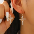 Detailed view of gold cross hoop earrings with shimmering cubic zirconia stones - KC Gold 10837 (Copper)