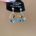 Detail of 925 silver gold butterfly earrings with blue gradient crystals on black card - Blue Butterfly Round Style / Blue