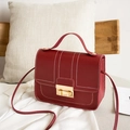 Classic red PU leather crossbody bag with white contrast stitching and gold lock - Burgundy