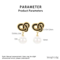 Detailed macro view of gold knot earrings with black enamel and 10mm white shell pearls - Gold Heart Knot Shell Pearl