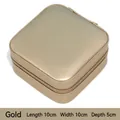 Compact gold faux leather jewelry box with zipper, measures 10x10x5 cm for travel storage - Gold