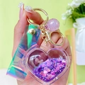Purple heart liquid quicksand keychain with holographic strap and golden lobster clasp - Purple