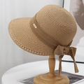 Handwoven khaki straw sun hat with wide brim, ribbon bow and elegant gold metal tag - Khaki