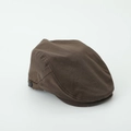 Detail view of the retro brown cotton fabric and side button on this boy's flat cap - 52cm (2-5 Years) / Brown
