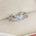 Close-up of double-layered silver heart ring with blue enamel and zircon stones - Blue Heart (Silver Base)