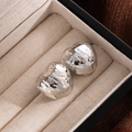 Silver heart stud earrings with hammered metal texture in a minimalist jewelry box - Silver Heart