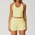 Completo yoga giallo chiaro con top allacciato al collo e pantaloncini a vita alta - S / Canotta + Pantaloncini / Giallo Germoglio