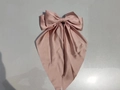 Elegant dusty rose satin bow hair clip with long ribbon streamers for a feminine look - Champagne Pink