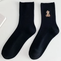 Classic black ribbed cotton crew socks featuring a cute cartoon bear embroidery detail - One Size / Black