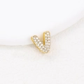 Macro view of a gold letter V pendant encrusted with sparkling cubic zirconia crystals - V (Single Pendant)