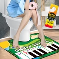 Macro detail of musical toilet piano mat with piano keys and hanging door sign - New Green Toilet Piano