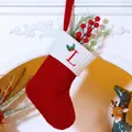 Red cable knit Christmas stocking with white cuff and embroidered letter L - Letter L / Red