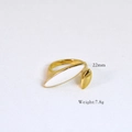Macro view of 14k gold plated vintage ring with white enamel inlay and 22mm dimensions - White Enamel Shuttle Shape Style